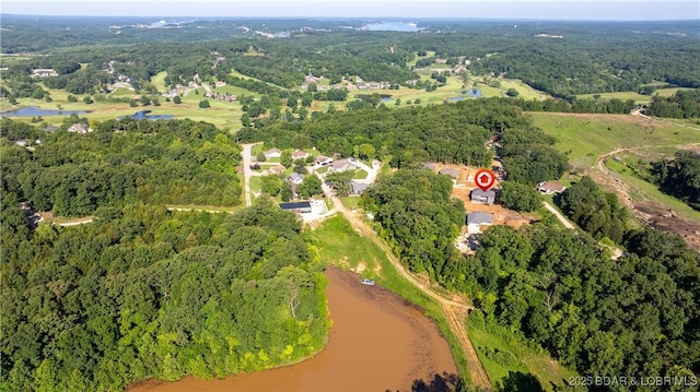 25 Sam Dr, Kaiser, MO 65047 - view of property location featuring a large body of water and a heavily wooded area