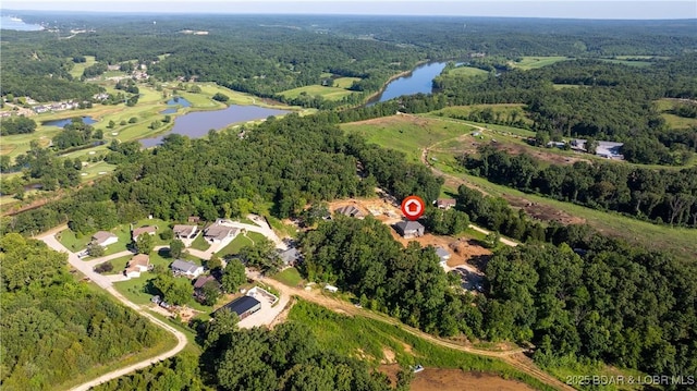 25 Sam Dr, Kaiser, MO 65047 - view of property location featuring a large body of water and a forest