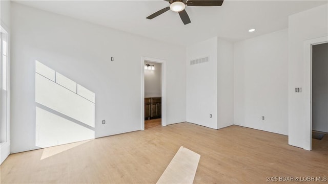25 Sam Dr, Kaiser, MO 65047 - spare room with ceiling fan and light wood-style flooring