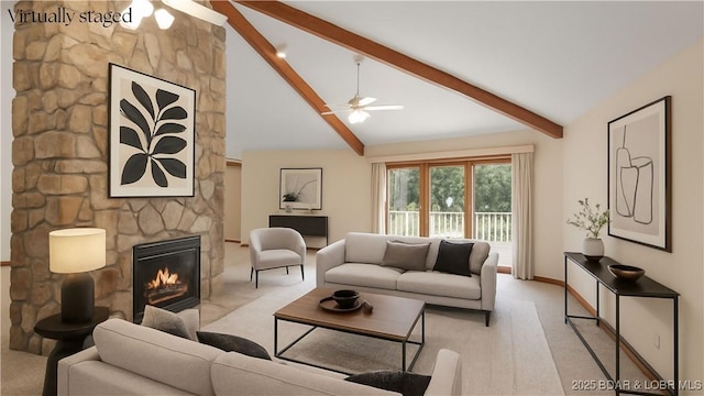 290 Fawn Meadows Dr, Linn Creek, MO 65052 - living area with a ceiling fan, light carpet, a stone fireplace, beamed ceiling, and high vaulted ceiling