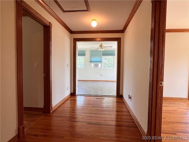 742 Pappys Pt, Sunrise Beach, MO 65079 - hall with wood finished floors, crown molding, and cooling unit