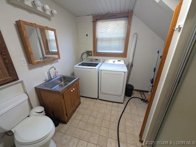 742 Pappys Pt, Sunrise Beach, MO 65079 - laundry area with independent washer and dryer, electric panel, and light tile patterned floors