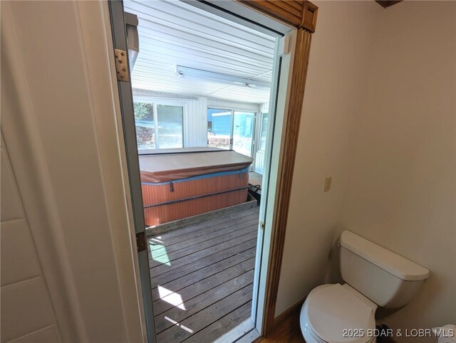 742 Pappys Pt, Sunrise Beach, MO 65079 - bathroom with toilet and wood finished floors
