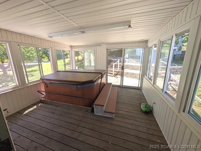 742 Pappys Pt, Sunrise Beach, MO 65079 - sunroom featuring a jacuzzi and plenty of natural light