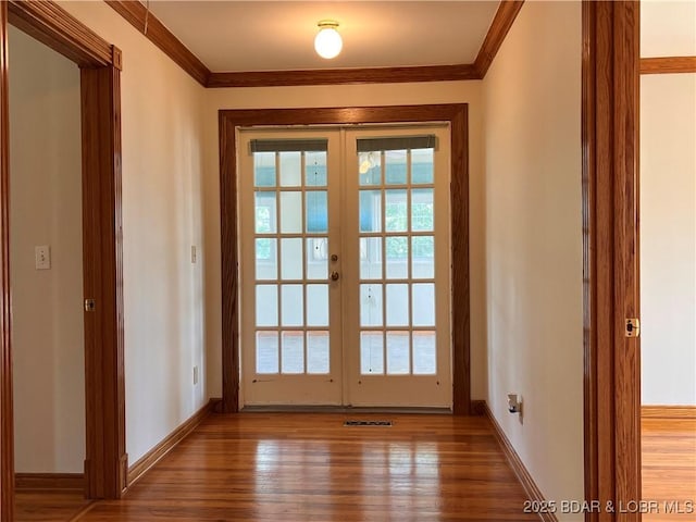 742 Pappys Pt, Sunrise Beach, MO 65079 - doorway with french doors, ornamental molding, and wood finished floors