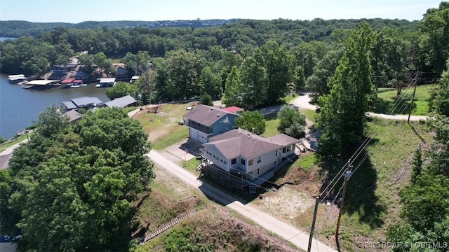 742 Pappys Pt, Sunrise Beach, MO 65079 - drone / aerial view of a forest and a nearby body of water