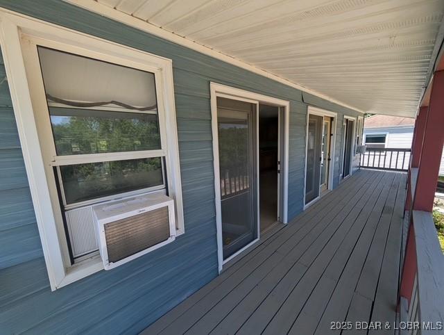 742 Pappys Pt, Sunrise Beach, MO 65079 - porch featuring cooling unit