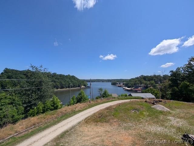 742 Pappys Pt, Sunrise Beach, MO 65079 - water view featuring a heavily wooded area