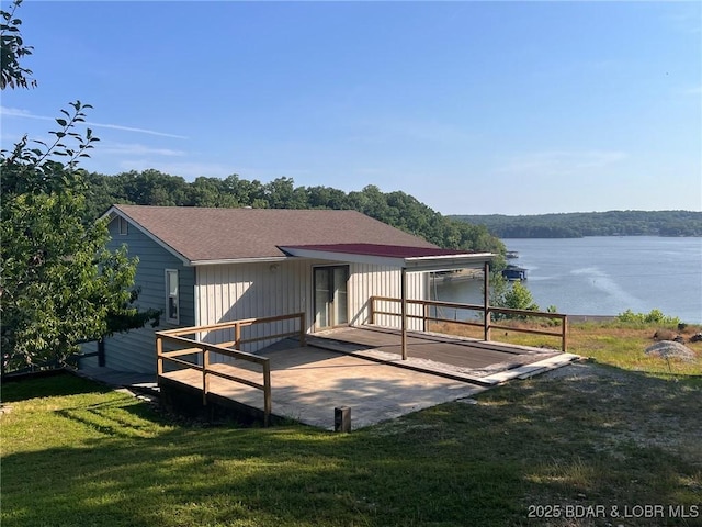 742 Pappys Pt, Sunrise Beach, MO 65079 - rear view of house featuring a yard and a deck with water view