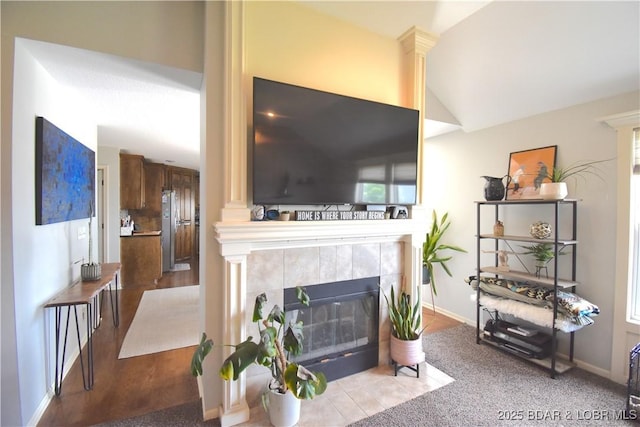 1207 SW 9th St, Oak Grove, MO 64075 - living room with vaulted ceiling and a fireplace