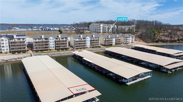 1481 Ledges Dr Unit B14, Osage Beach, MO 65065 - drone / aerial view of apartment complex / building and a nearby body of water