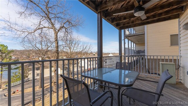 1481 Ledges Dr Unit B14, Osage Beach, MO 65065 - balcony featuring a ceiling fan and outdoor dining area
