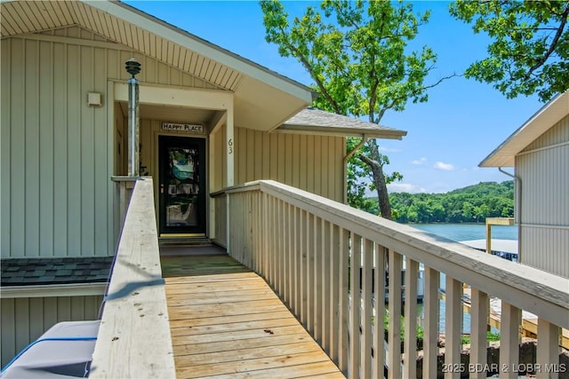 889 Malibu Rd Unit 63, Osage Beach, MO 65049 - view of exterior entry featuring a shingled roof