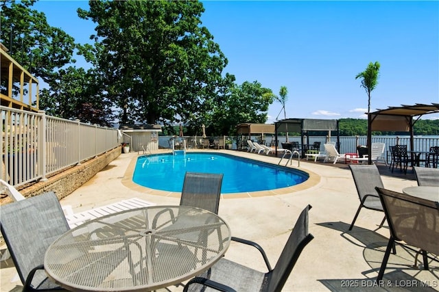 889 Malibu Rd Unit 63, Osage Beach, MO 65049 - community pool with outdoor dining space, a patio area, and a fenced backyard