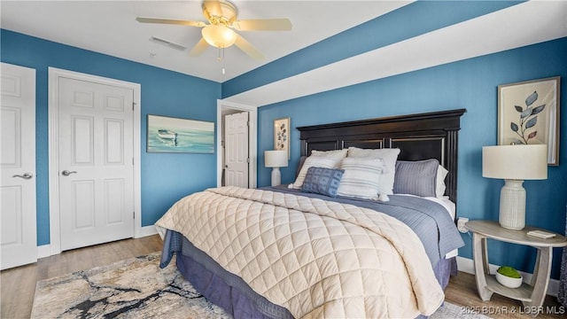 4800 Eagleview Dr Unit 433, Osage Beach, MO 65065 - bedroom featuring wood finished floors and ceiling fan