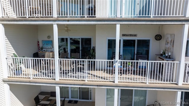 4800 Eagleview Dr Unit 433, Osage Beach, MO 65065 - exterior space with a balcony, ceiling fan, and stucco siding