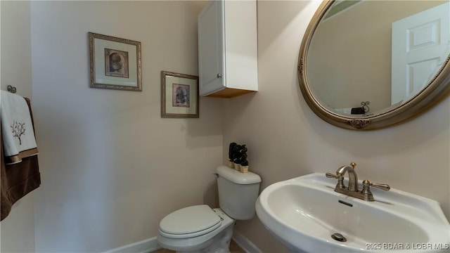 895 Summer Place Dr Unit 3A, Camdenton, MO 65020 - half bathroom with a sink and toilet