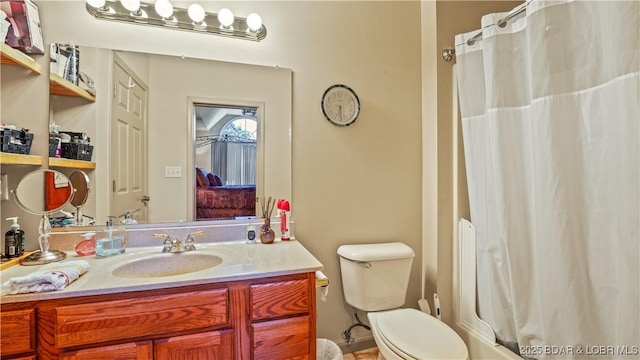 1126 Buckingham Dr, Camdenton, MO 65020 - bathroom featuring vanity and toilet