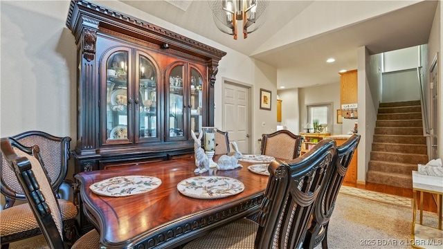 1126 Buckingham Dr, Camdenton, MO 65020 - dining area featuring stairway, lofted ceiling, recessed lighting, and a ceiling fan