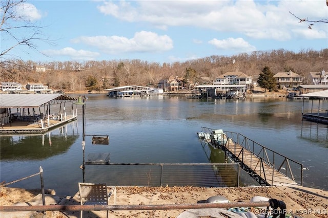 740 Twin Valley Loop, Linn Creek, MO 65052 - dock featuring a water view and boat lift