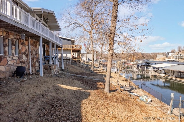 740 Twin Valley Loop, Linn Creek, MO 65052 - view of yard with a balcony and a dock