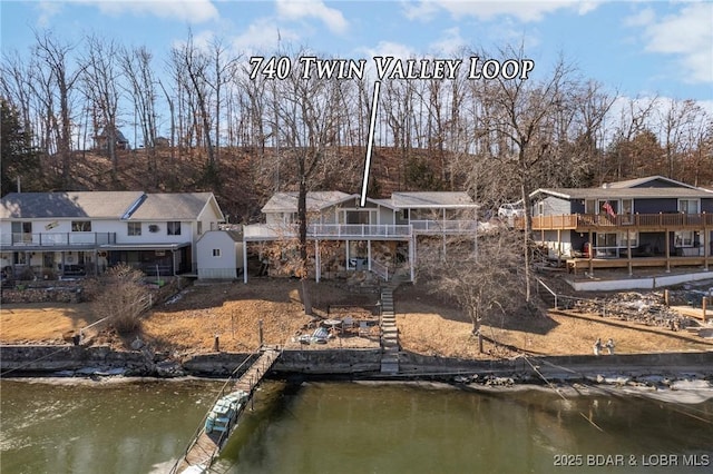 740 Twin Valley Loop, Linn Creek, MO 65052 - rear view of house with stairs and a deck with water view