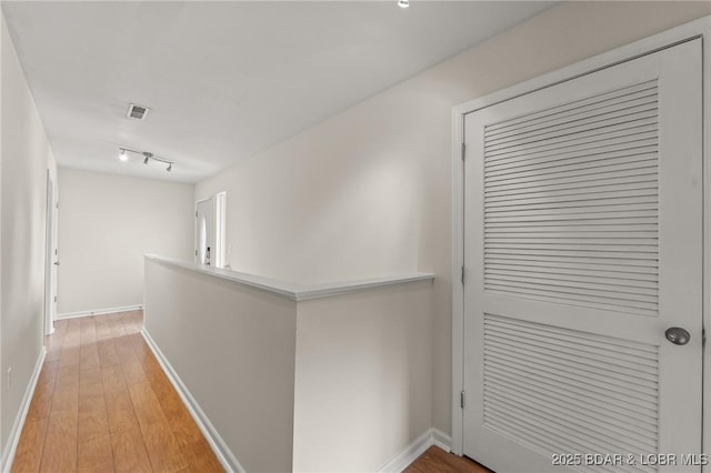 1629 Timber Creek Dr Unit 1629, Columbia, MO 65202 - hallway with baseboards and light wood finished floors
