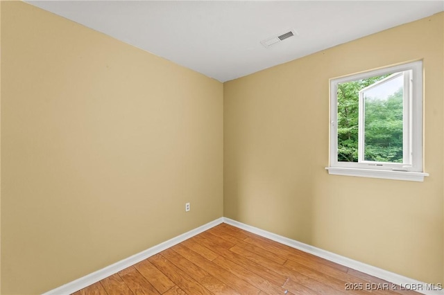 1629 Timber Creek Dr Unit 1629, Columbia, MO 65202 - empty room featuring baseboards and light wood-type flooring