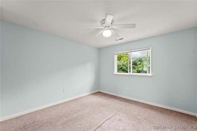 1629 Timber Creek Dr Unit 1629, Columbia, MO 65202 - empty room featuring carpet flooring and a ceiling fan