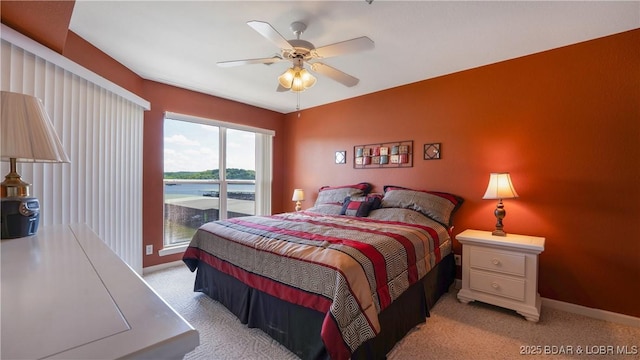 133 Cedar Glen Dr Unit 3B, Camdenton, MO 65020 - bedroom featuring access to outside, light carpet, and a ceiling fan