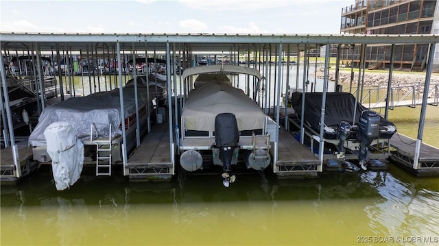 133 Cedar Glen Dr Unit 3B, Camdenton, MO 65020 - dock featuring a water view and boat lift
