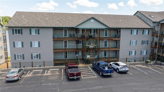 133 Cedar Glen Dr Unit 3B, Camdenton, MO 65020 - view of building exterior featuring uncovered parking