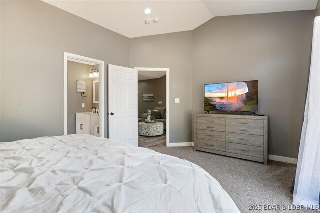 576 Racquet Club Dr Unit 407, Lake Ozark, MO 65049 - carpeted bedroom with vaulted ceiling and ensuite bath