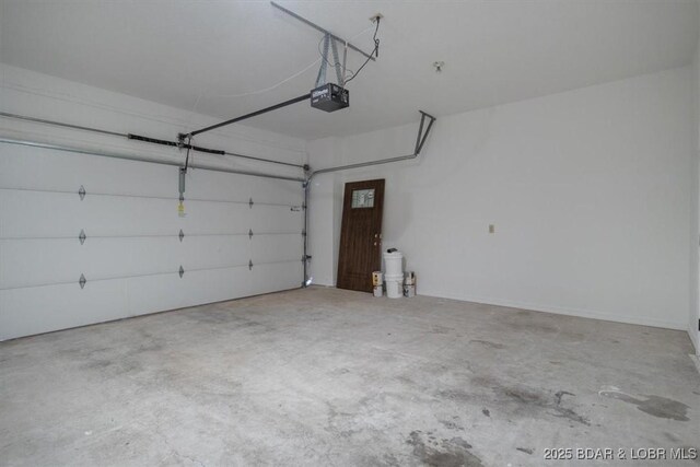 576 Racquet Club Dr Unit 407, Lake Ozark, MO 65049 - garage featuring a garage door opener