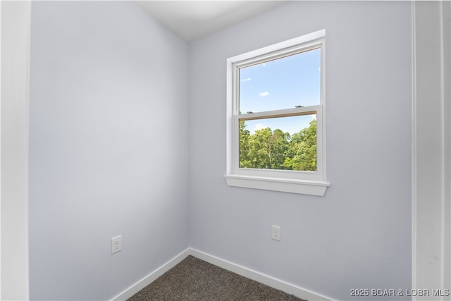 40 Walnut Ct, Eldon, MO 65026 - empty room featuring baseboards and dark colored carpet