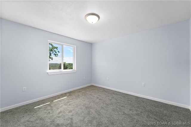 40 Walnut Ct, Eldon, MO 65026 - unfurnished room with carpet floors and baseboards