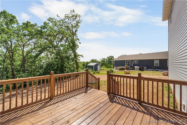 40 Walnut Ct, Eldon, MO 65026 - deck featuring a storage shed