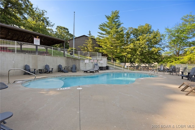 19 Catalpa Ct Unit 2D, Lake Ozark, MO 65049 - community pool featuring a patio