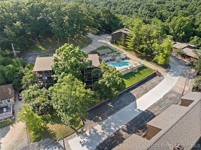 19 Catalpa Ct Unit 2D, Lake Ozark, MO 65049 - aerial view of a pool and a forest