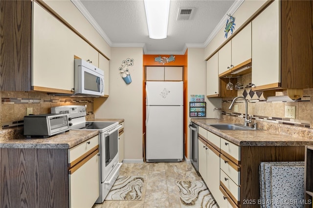 19 Catalpa Ct Unit 2D, Lake Ozark, MO 65049 - kitchen featuring white appliances, decorative backsplash, a textured ceiling, and ornamental molding