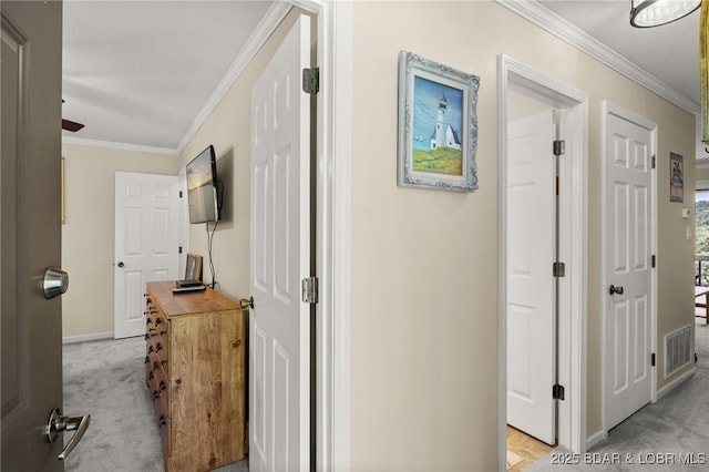 19 Catalpa Ct Unit 2D, Lake Ozark, MO 65049 - hallway with light colored carpet and ornamental molding