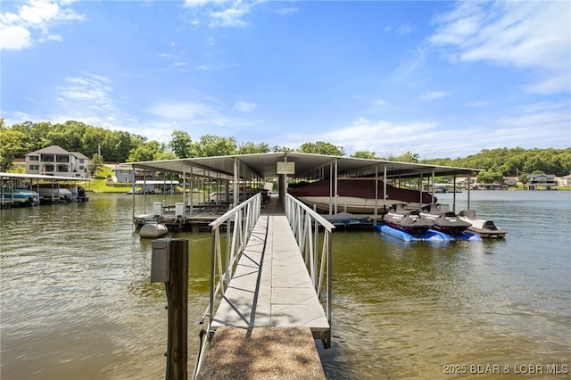19 Catalpa Ct Unit 2D, Lake Ozark, MO 65049 - dock featuring a water view and boat lift
