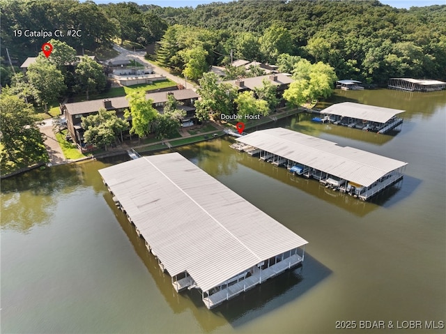 19 Catalpa Ct Unit 2C, Lake Ozark, MO 65049 - bird's eye view of a heavily wooded area and a nearby body of water