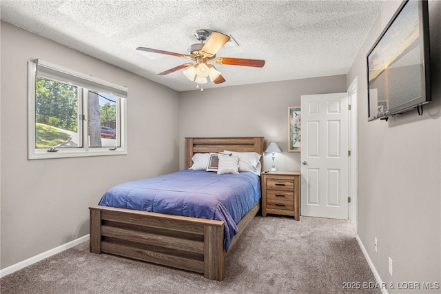 19 Catalpa Ct Unit 2C, Lake Ozark, MO 65049 - bedroom featuring carpet floors, a textured ceiling, and ceiling fan