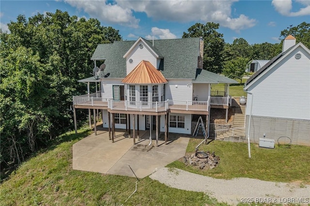 1480 Copperstone Rd, Camdenton, MO 65020 - rear view of property featuring a patio, a wooden deck, a yard, and roof with shingles