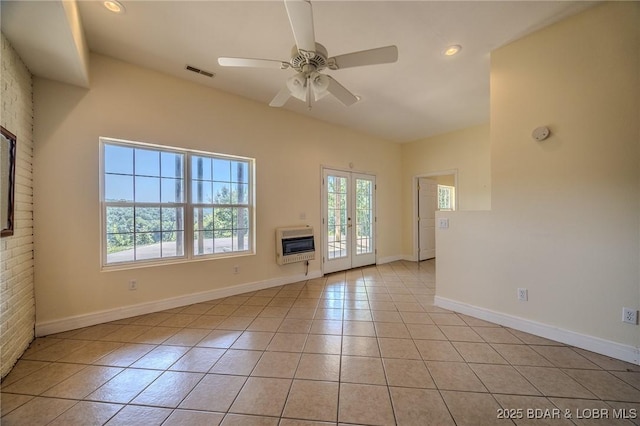 1480 Copperstone Rd, Camdenton, MO 65020 - unfurnished living room with heating unit, plenty of natural light, light tile patterned floors, a ceiling fan, and recessed lighting
