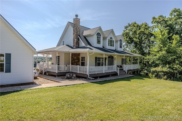 1480 Copperstone Rd, Camdenton, MO 65020 - view of front of property featuring covered porch, a front lawn, and a shingled roof