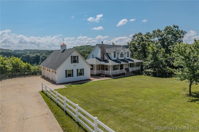1480 Copperstone Rd, Camdenton, MO 65020 - rear view of house with a garage, a porch, and concrete driveway