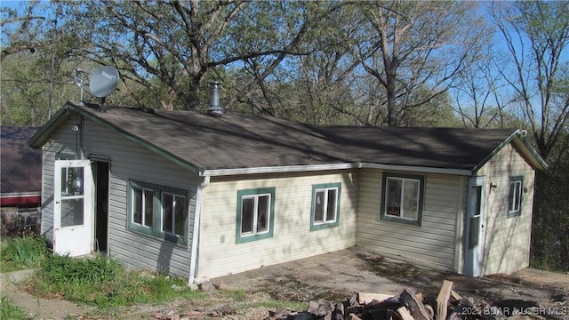 87 Central Ozarks Rd, Edwards, MO 65326 - view of home's exterior featuring roof with shingles