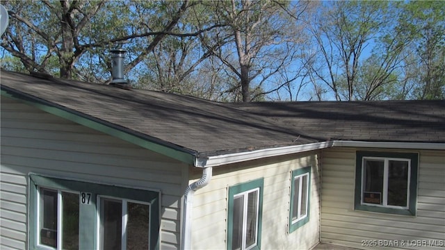 87 Central Ozarks Rd, Edwards, MO 65326 - view of side of home featuring a shingled roof